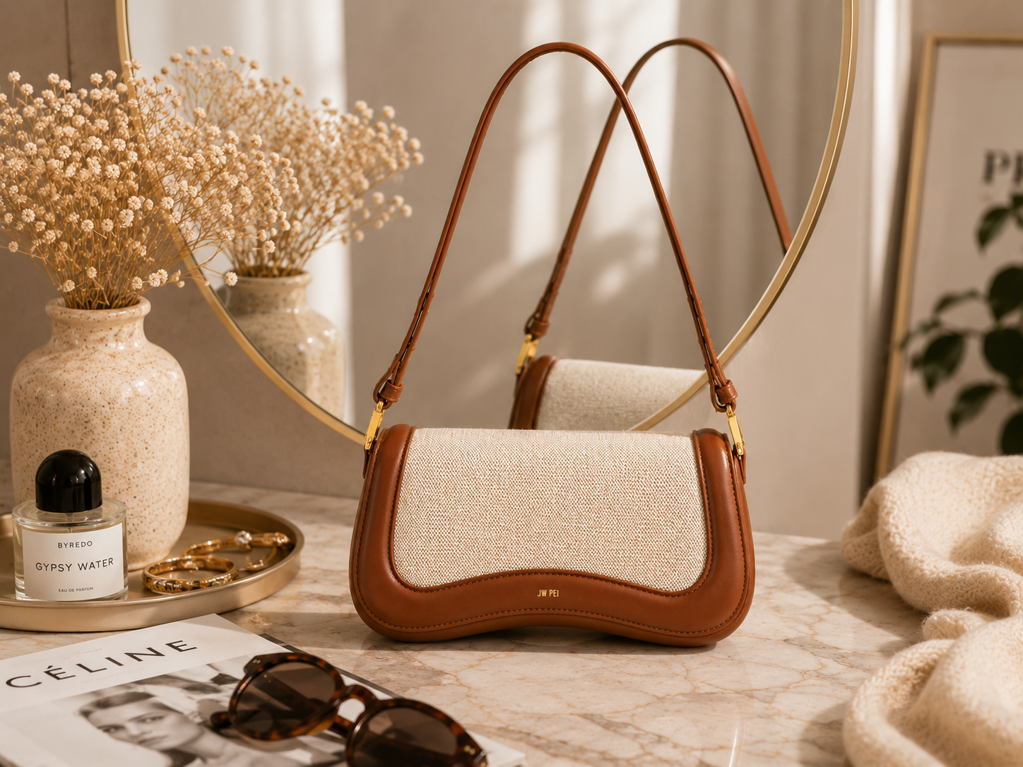 Curved shoulder bag styled for spring and summer occasions