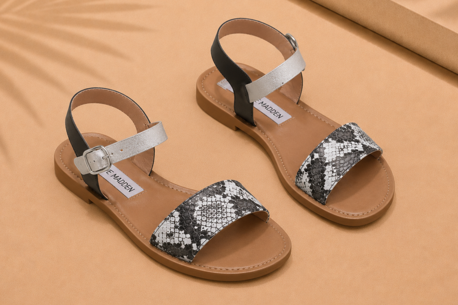 Snake-print embossed flat sandal mimicking a luxury exotic leather finish